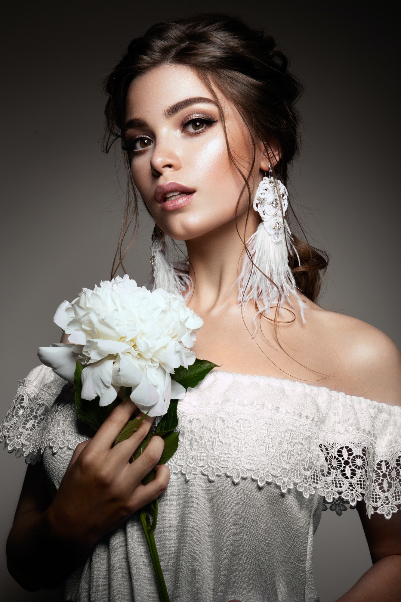 glamour portrait of beautiful woman model with fresh daily makeup and romantic wavy hairstyle